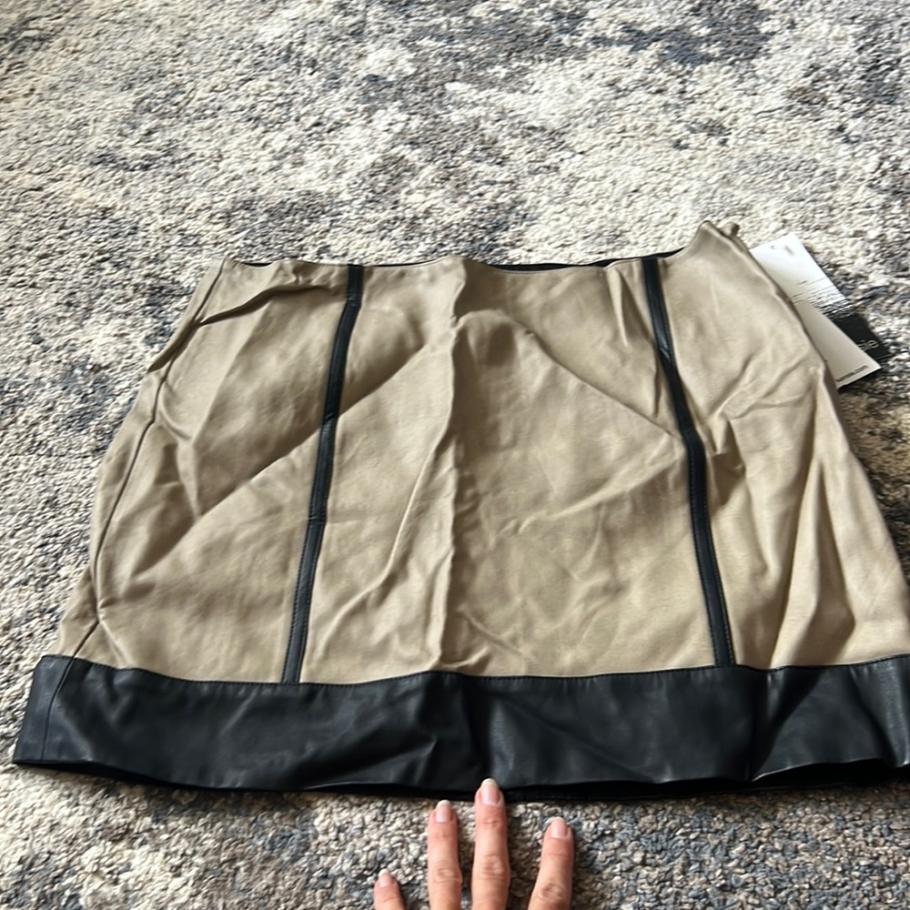 Beige and black leather skirt